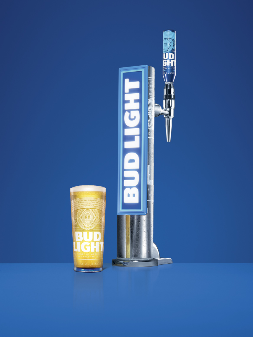 Fresh pint of Bud Light beer next to pump by Alexander Kent London based still life and product photographer.