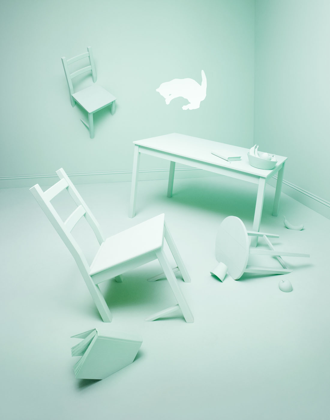 Furniture sinking in a green room by Alexander Kent London based still life and product photographer.