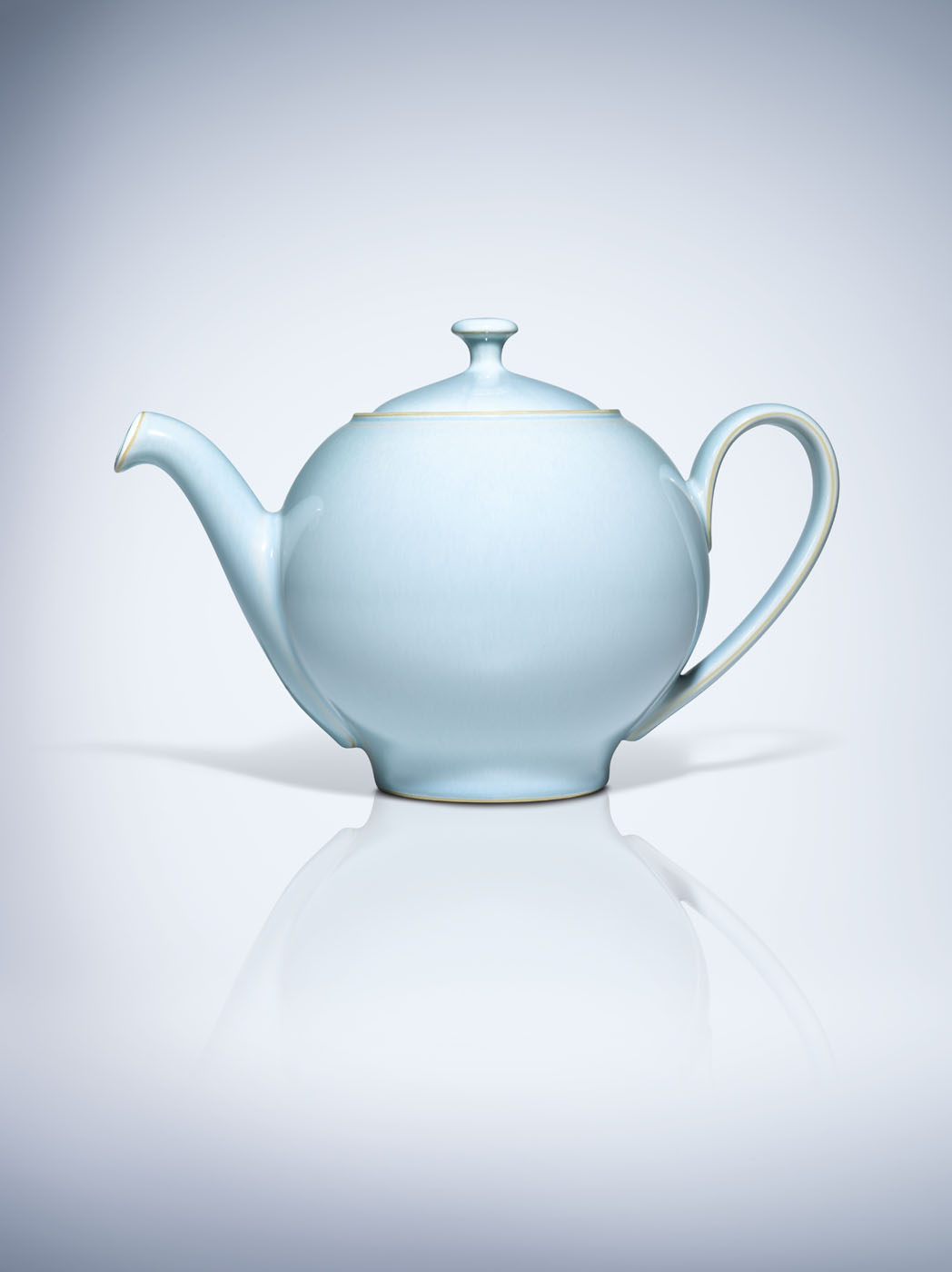 Blue teapot in studio by Alexander Kent London based still life and product photographer.