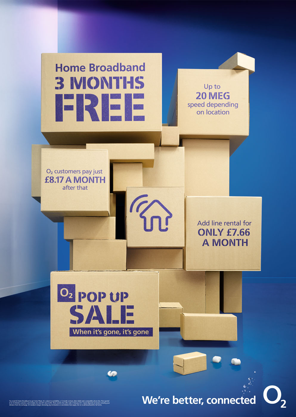 Boxes in warehouse with blue walls by Alexander Kent London based still life and product photographer.
