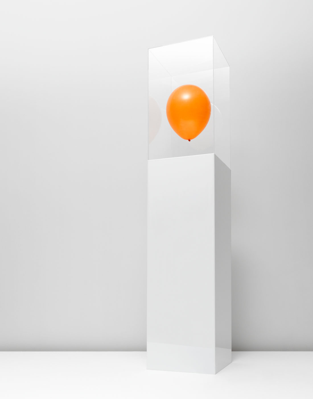 Trapped balloon in perspex by Alexander Kent London based still life and product photographer.