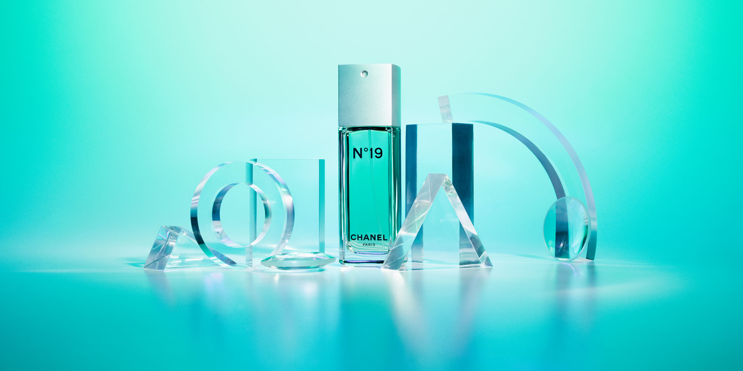 No 19 perfume with perspex blocks by Alexander Kent London based still life and product photographer.