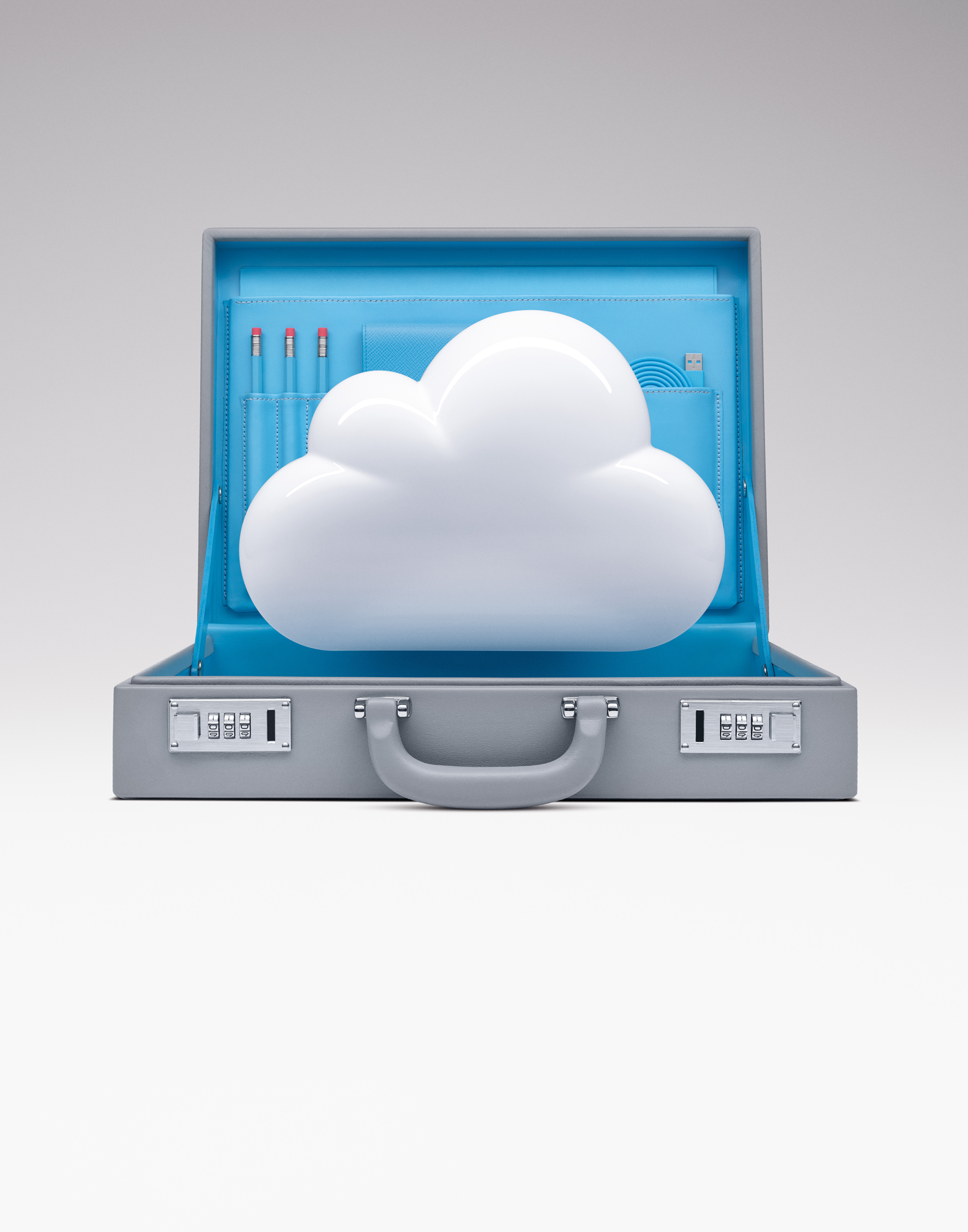 Internet cloud emerging from briefcase by Alexander Kent London based still life and product photographer.